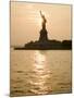 Sun Setting Behind the Statue of Liberty on a Summer Evening-John Nordell-Mounted Photographic Print