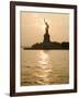 Sun Setting Behind the Statue of Liberty on a Summer Evening-John Nordell-Framed Photographic Print