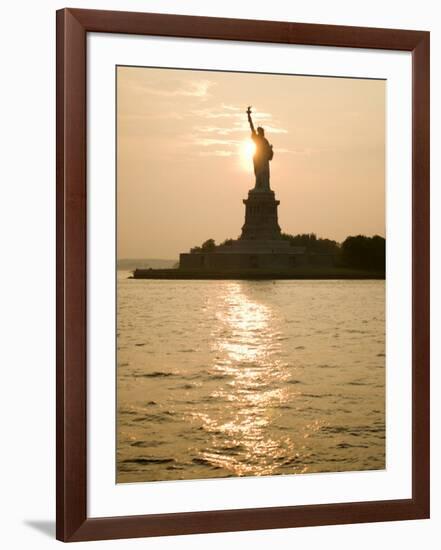 Sun Setting Behind the Statue of Liberty on a Summer Evening-John Nordell-Framed Photographic Print