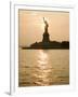 Sun Setting Behind the Statue of Liberty on a Summer Evening-John Nordell-Framed Photographic Print