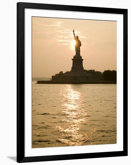 Sun Setting Behind the Statue of Liberty on a Summer Evening-John Nordell-Framed Photographic Print