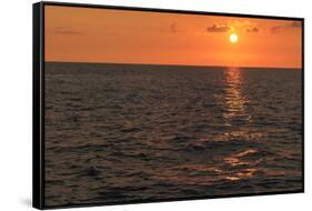 Sun setting on ocean off Maui, Hawaii, USA-Stuart Westmorland-Framed Stretched Canvas