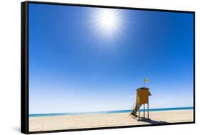 Sun shining over the lifeguard's cabin by the ocean, Morro Jable, Fuerteventura-Roberto Moiola-Framed Stretched Canvas