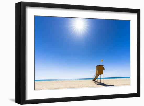 Sun shining over the lifeguard's cabin by the ocean, Morro Jable, Fuerteventura-Roberto Moiola-Framed Photographic Print