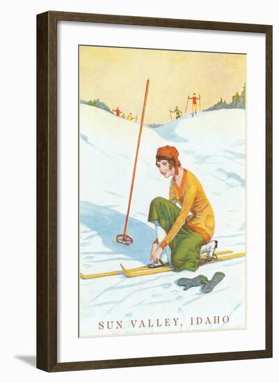 Sun Valley, Idaho, Lady Skier Fixing Bindings-null-Framed Art Print