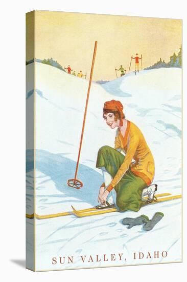 Sun Valley, Idaho, Lady Skier Fixing Bindings-null-Stretched Canvas