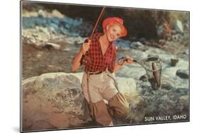 Sun Valley, Idaho, Woman with Fish in Net-null-Mounted Art Print