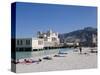Sunbathers on Beach Near the Pier, Mondello, Palermo, Sicily, Italy, Europe-Martin Child-Stretched Canvas