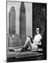 Sunbathing in a Highrise in New York-null-Mounted Premium Photographic Print