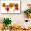 Sunflowers and lilies against white background-Panoramic Images-Photographic Print displayed on a wall