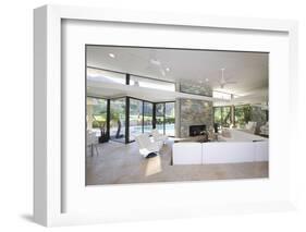 Sunken Seating Area and Exposed Stone Fireplace in Spacious Living Room with View-Nosnibor137-Framed Photographic Print