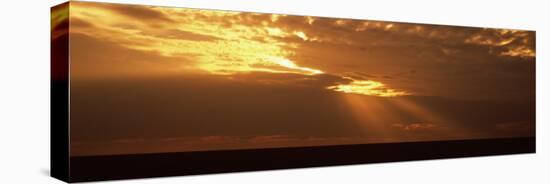 Sunlight Radiating Through Clouds at Sunset, Masai Mara National Reserve, Kenya-null-Stretched Canvas