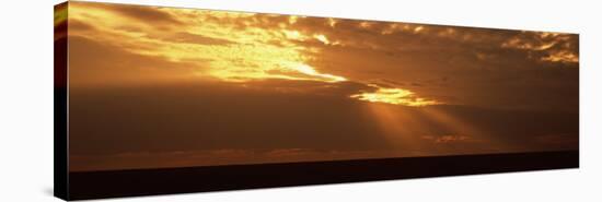 Sunlight Radiating Through Clouds at Sunset, Masai Mara National Reserve, Kenya-null-Stretched Canvas