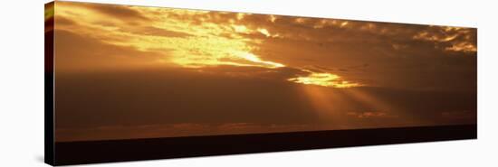 Sunlight Radiating Through Clouds at Sunset, Masai Mara National Reserve, Kenya-null-Stretched Canvas
