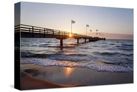 Sunrise above the Pier of the Baltic Seaside Resort of Dahme, Schleswig-Holstein, Germany-null-Stretched Canvas