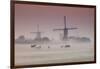 Sunrise and Morning Fog with Silhouetted Windmills and Horses in Field Kinderdijk, Netherlands-Darrell Gulin-Framed Photographic Print