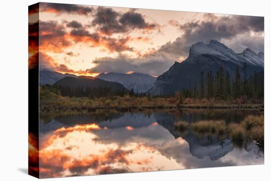 Sunrise and storm clouds at Vermillion Lakes with Mount Rundle in autumn, Canada-Jon Reaves-Stretched Canvas