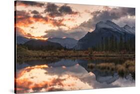 Sunrise and storm clouds at Vermillion Lakes with Mount Rundle in autumn, Canada-Jon Reaves-Stretched Canvas