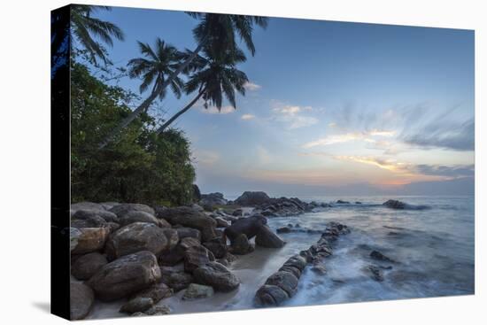 Sunrise at a Secluded Lagoon with Rocks and Palm Trees Framing the View-Charlie-Stretched Canvas