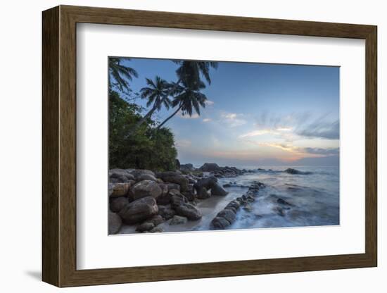 Sunrise at a Secluded Lagoon with Rocks and Palm Trees Framing the View-Charlie-Framed Photographic Print