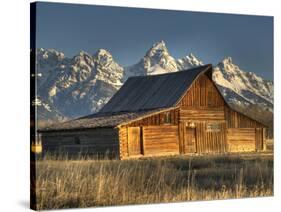 Sunrise at the Mormon Row Barn in Wyoming's Grand Teton National Park-Kyle Hammons-Stretched Canvas