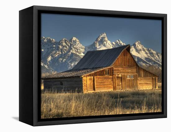 Sunrise at the Mormon Row Barn in Wyoming's Grand Teton National Park-Kyle Hammons-Framed Stretched Canvas