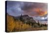 Sunrise clouds over Bear Mountain in Glacier National Park, Montana, USA-Chuck Haney-Stretched Canvas
