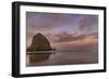Sunrise clouds over Haystack Rock in Cannon Beach, Oregon, USA-Chuck Haney-Framed Photographic Print