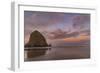 Sunrise clouds over Haystack Rock in Cannon Beach, Oregon, USA-Chuck Haney-Framed Photographic Print