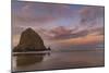 Sunrise clouds over Haystack Rock in Cannon Beach, Oregon, USA-Chuck Haney-Mounted Photographic Print