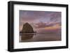 Sunrise clouds over Haystack Rock in Cannon Beach, Oregon, USA-Chuck Haney-Framed Photographic Print