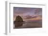 Sunrise clouds over Haystack Rock in Cannon Beach, Oregon, USA-Chuck Haney-Framed Photographic Print