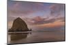 Sunrise clouds over Haystack Rock in Cannon Beach, Oregon, USA-Chuck Haney-Mounted Photographic Print