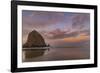 Sunrise clouds over Haystack Rock in Cannon Beach, Oregon, USA-Chuck Haney-Framed Photographic Print