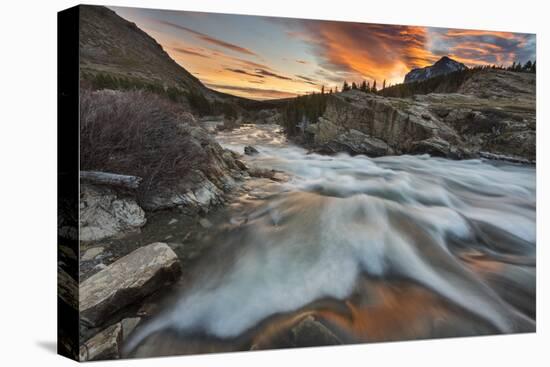 Sunrise Clouds over Swiftcurrent Falls, Glacier NP, Montana, USA-Chuck Haney-Stretched Canvas