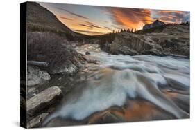 Sunrise Clouds over Swiftcurrent Falls, Glacier NP, Montana, USA-Chuck Haney-Stretched Canvas
