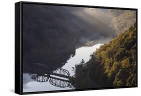 Sunrise filtering into the New River Gorge at Hawks Nest State Park in Ansted, West Virginia, USA-Chuck Haney-Framed Stretched Canvas