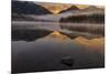 Sunrise fog on Holland Lake in the Flathead National Forest, Montana, USA-Chuck Haney-Mounted Photographic Print