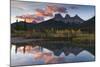 Sunrise in autumn at Three Sisters Peaks near Banff National Park, Canmore-Jon Reaves-Mounted Photographic Print