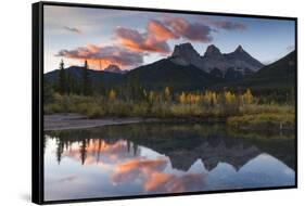 Sunrise in autumn at Three Sisters Peaks near Banff National Park, Canmore-Jon Reaves-Framed Stretched Canvas