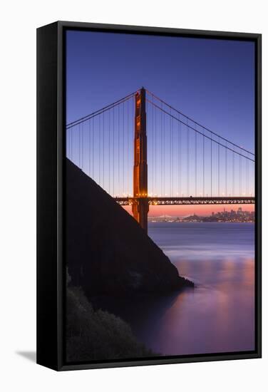 Sunrise Of A Single Bridge Of The Golden Gate Bridge, With The San Francisco Skyline And Bay Bridge-Joe Azure-Framed Stretched Canvas