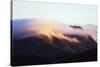 Sunrise on a cloud topped mountain, Andringitra National Park, Ambalavao, central area, Madagascar,-Christian Kober-Stretched Canvas