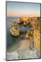 Sunrise on the Cliffs and Turquoise Water of the Ocean, Praia Da Marinha, Caramujeira-Roberto Moiola-Mounted Photographic Print