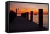 Sunrise on the Water with an Empty Dock and a Sailboat in the Distance of Tilghman Island, Maryland-Karine Aigner-Framed Stretched Canvas