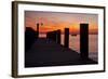 Sunrise on the Water with an Empty Dock and a Sailboat in the Distance of Tilghman Island, Maryland-Karine Aigner-Framed Photographic Print