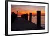 Sunrise on the Water with an Empty Dock and a Sailboat in the Distance of Tilghman Island, Maryland-Karine Aigner-Framed Photographic Print