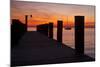 Sunrise on the Water with an Empty Dock and a Sailboat in the Distance of Tilghman Island, Maryland-Karine Aigner-Mounted Photographic Print