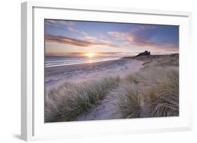 Sunrise over Bamburgh Beach and Castle from the Sand Dunes, Northumberland, England. Spring (March)-Adam Burton-Framed Photographic Print