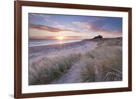 Sunrise over Bamburgh Beach and Castle from the Sand Dunes, Northumberland, England. Spring (March)-Adam Burton-Framed Photographic Print