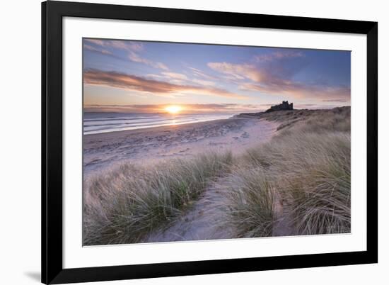 Sunrise over Bamburgh Beach and Castle from the Sand Dunes, Northumberland, England. Spring (March)-Adam Burton-Framed Photographic Print